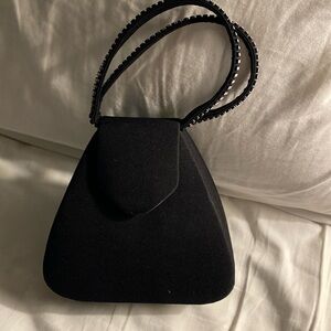 Unusual shaped black satin dress bag